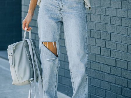 Distressed Asymmetric Waist Jeans Hot on Sale